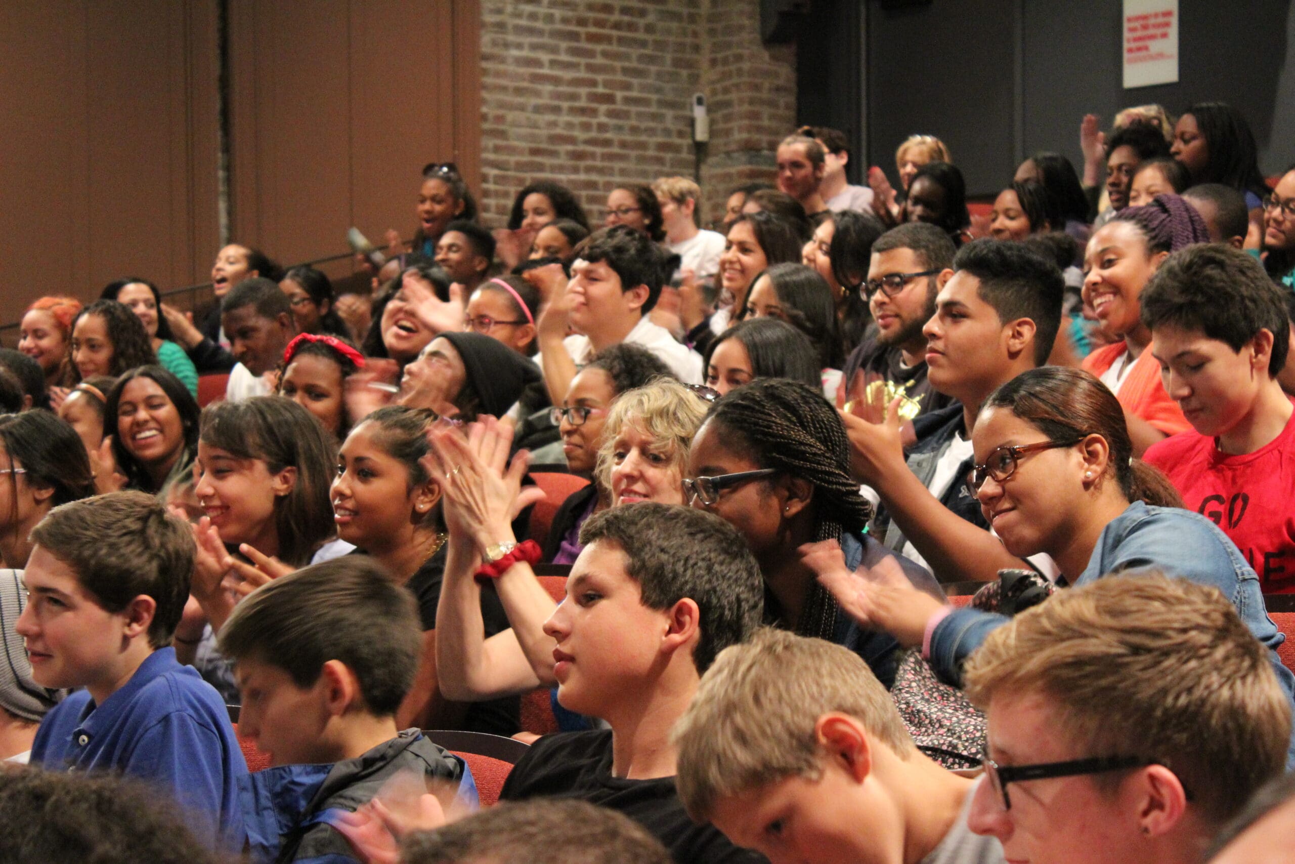 a group of people in a auditorium