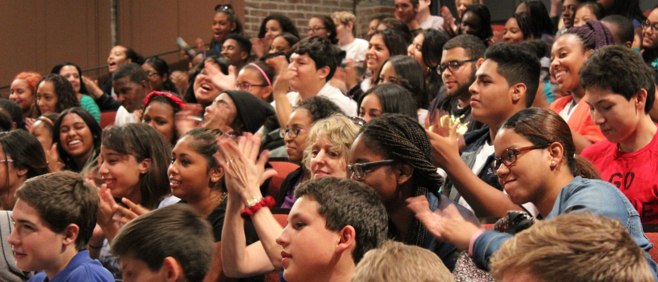 a group of people in a auditorium