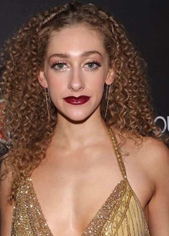 Micaela Diamond in a gold dress at the premiere of "A Play Is a Poem