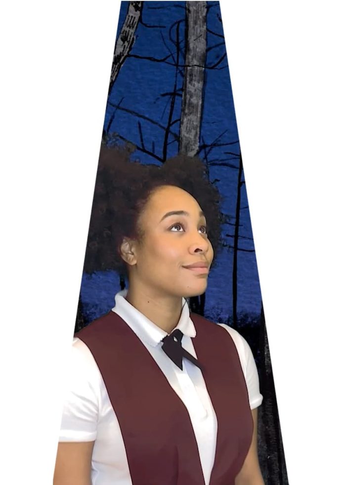 Young woman in maroon vest and white shirt, looking up thoughtfully against a dark blue forest background. "She Persisted" musical.