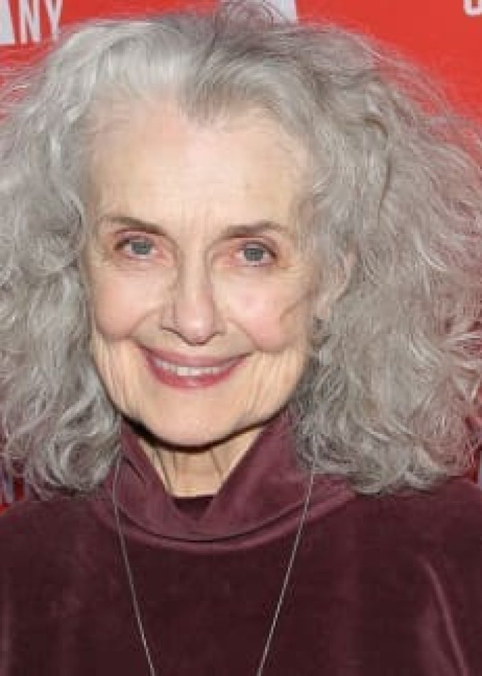 Mary Beth Peil smiling at an event, Atlantic Theater Company backdrop