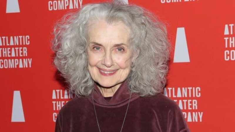 Mary Beth Peil smiling at an event, Atlantic Theater Company backdrop