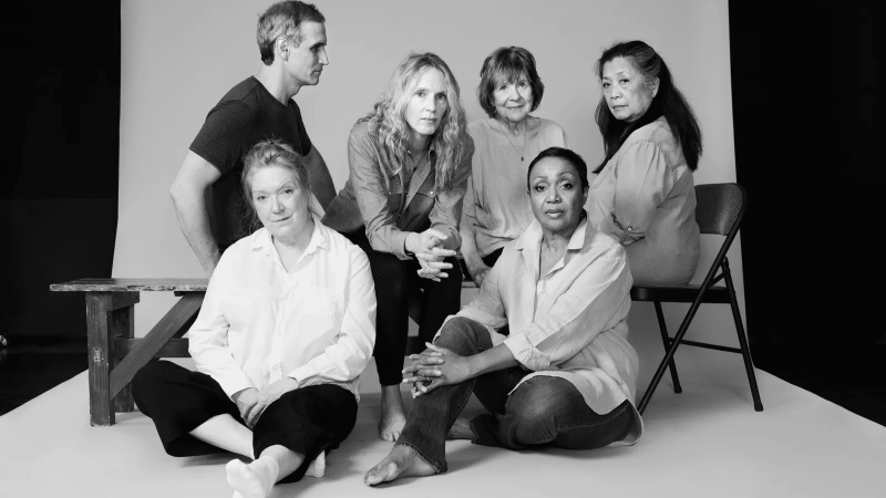 Cast of Annie Baker's "Infinite Life" in a group photo, featuring actors seated and standing.