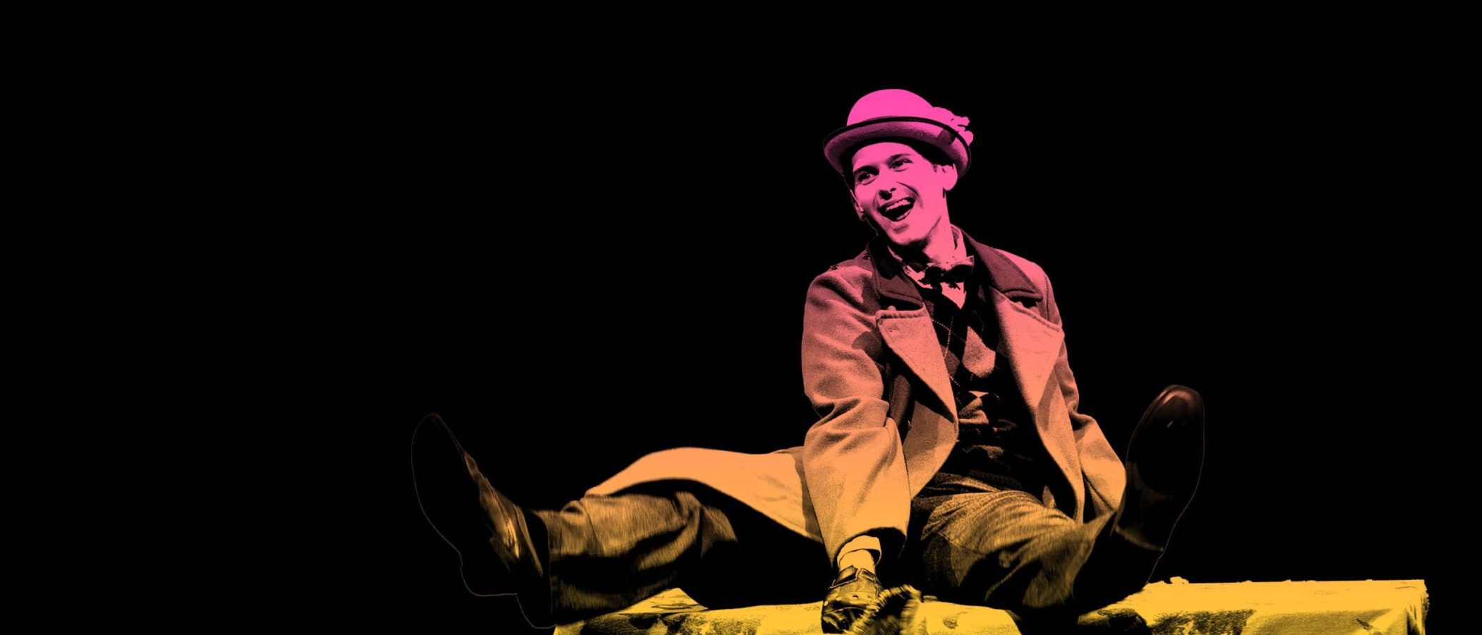 2700x1800_AFK-James_Hero_V1-scaled Actor playfully perched on a table, reminiscent of James from James and the Giant Peach.