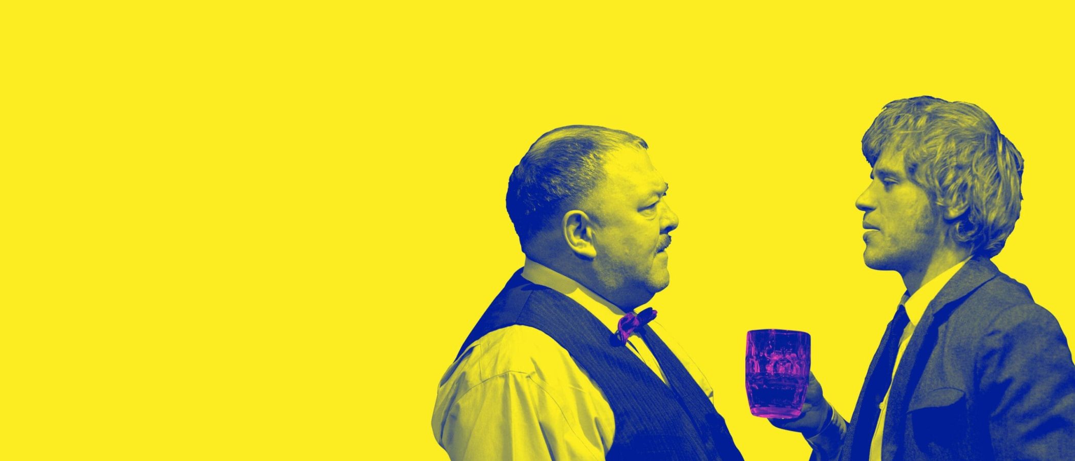 Two men, one holding a drink, in profile view against a yellow background.