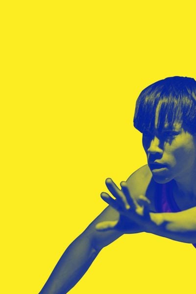 Athlete in dynamic pose, showcasing strength and athleticism.