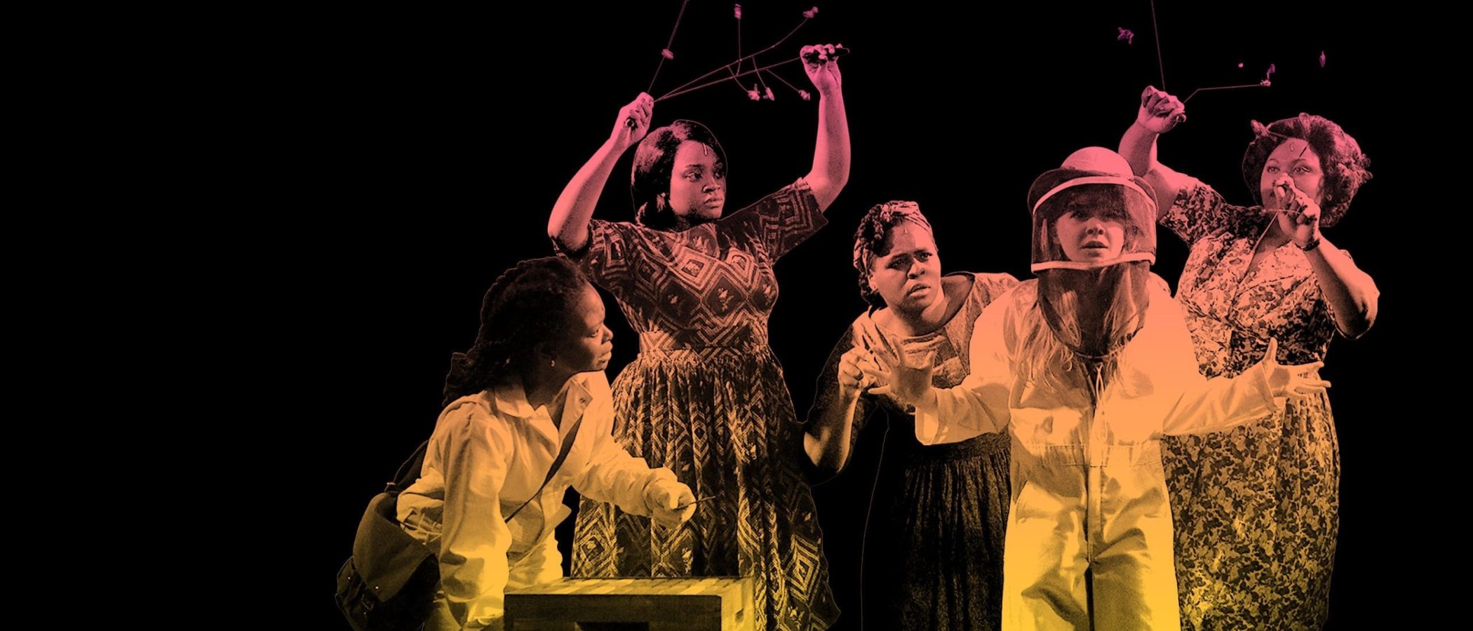 Five women, some holding branches, near a beehive. The secret life of bees.