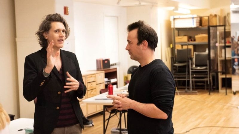 Lucas Hnath speaking with Kally Patz in a rehearsal space.