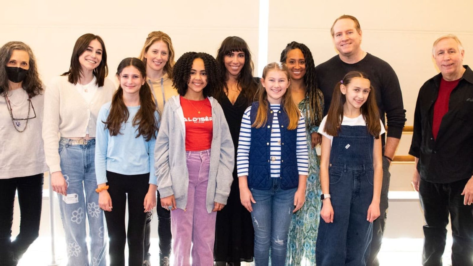 Cast and crew of the musical "The Bedwetter" pose for a group photo.