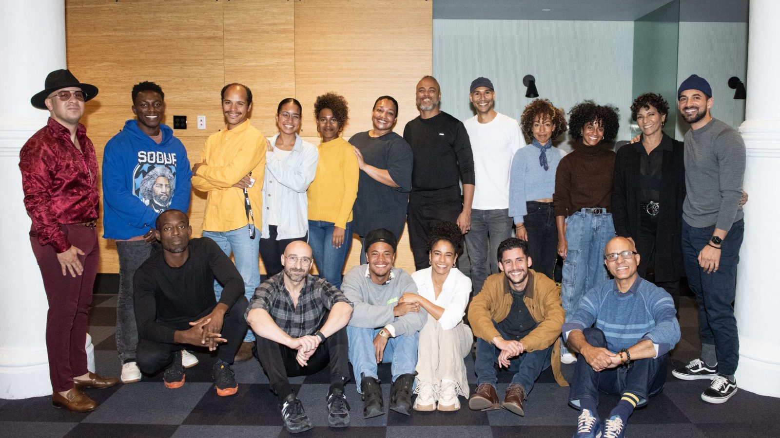 The Buena Vista Social Club cast and crew pose for a group photo.
