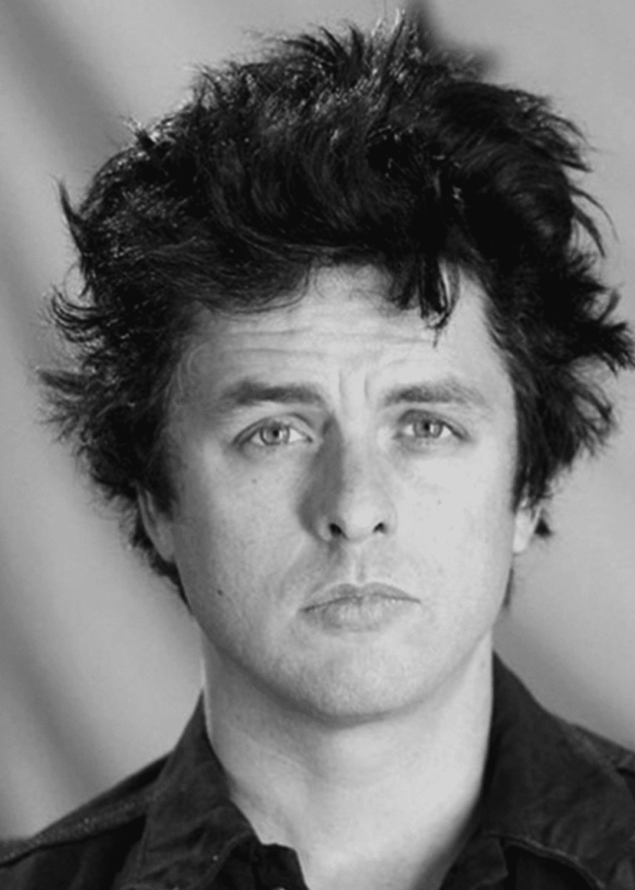 Billie Joe Armstrong, Green Day frontman, looking directly at the camera.