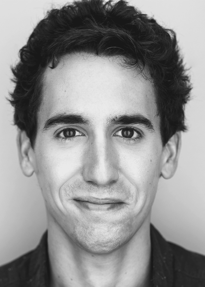 Headshot of Brendan Dalton, looking directly at the camera with a slight smile.