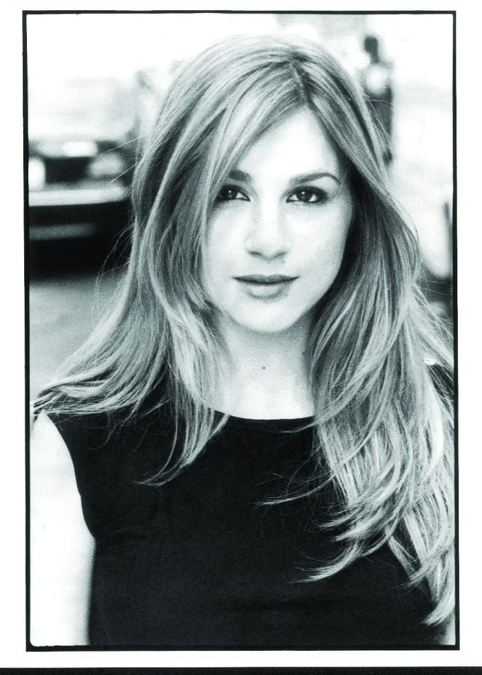 Aya Cash, actress, in a black and white portrait