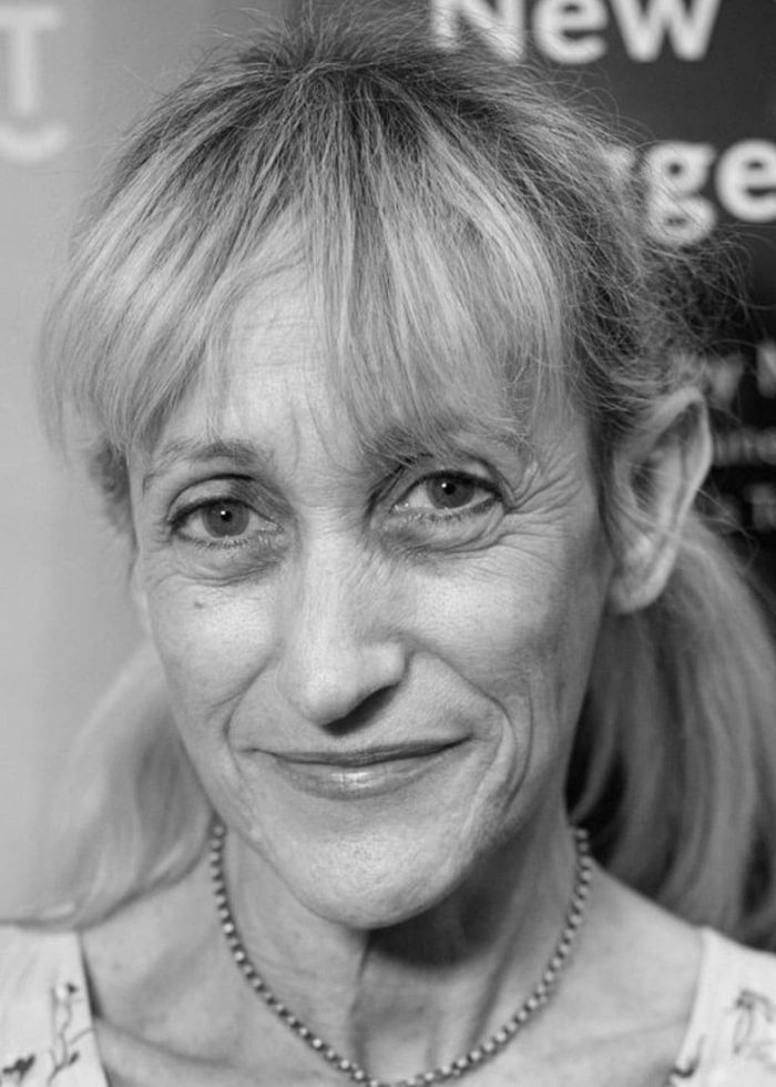 Constance Shulman, smiling in a close-up portrait.