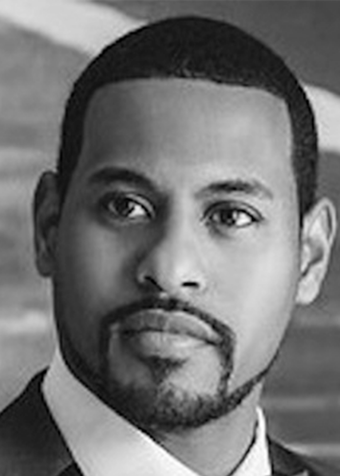 closeup of a man's face with a beard and short hair