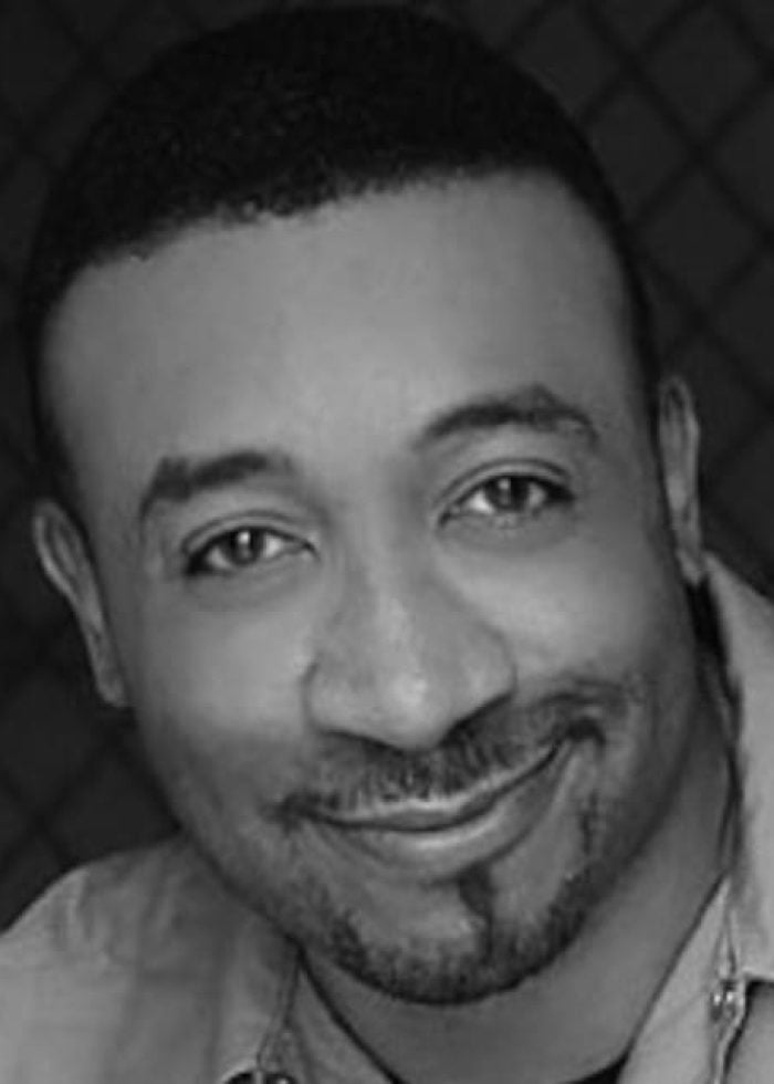 David Jennings smiling in a headshot portrait.