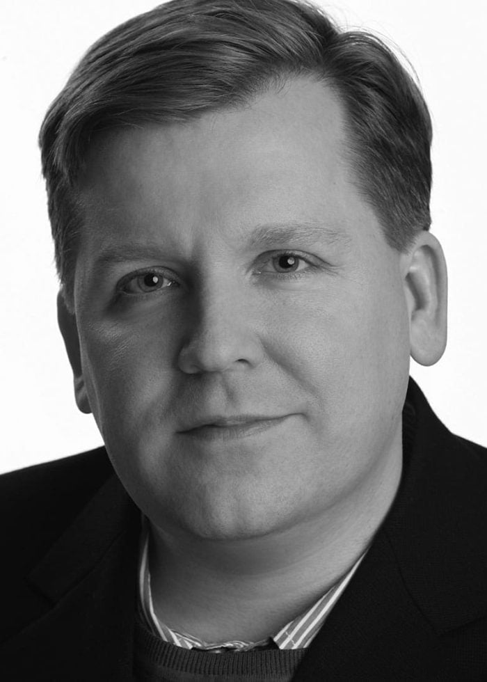 David Lindsay-Abaire, playwright, in a black and white portrait