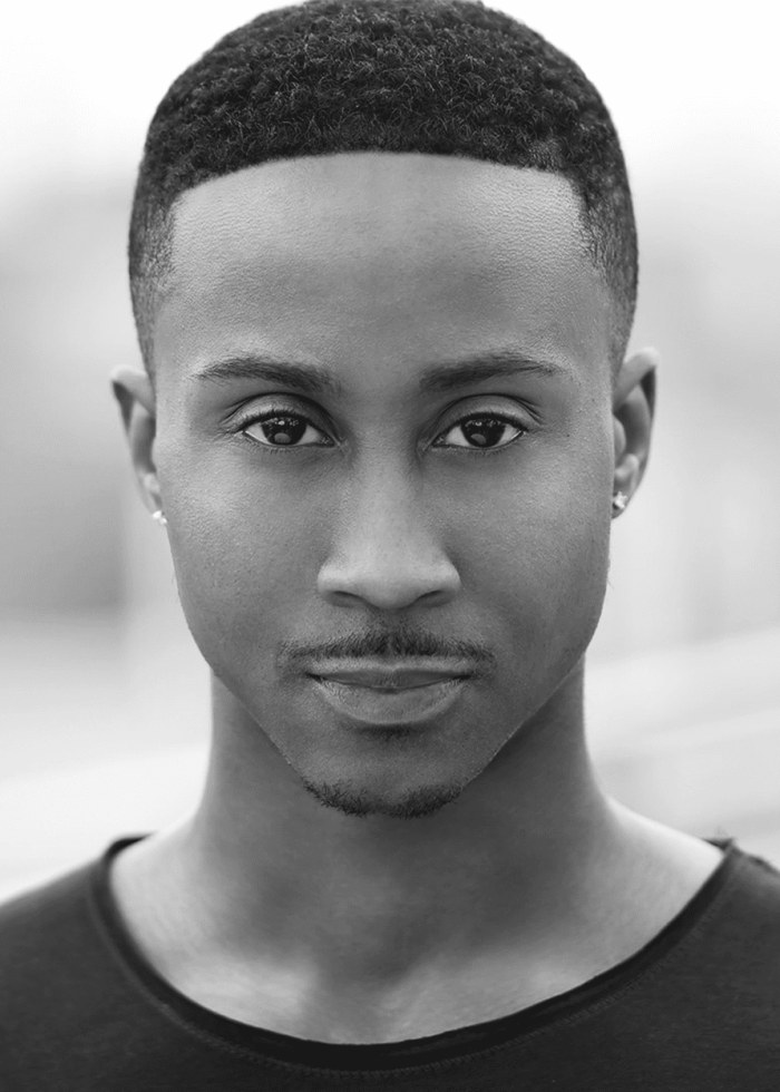 Headshot of David Pegram, a man with short, dark hair and a slight smile.