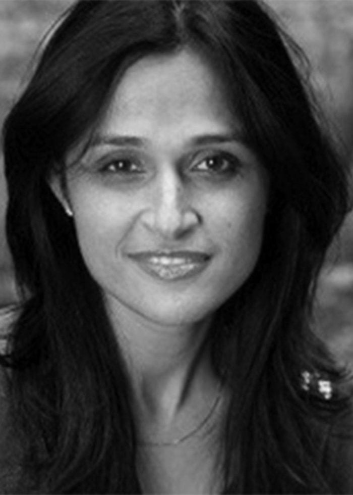 Deepa Purohit smiling, looking directly at the camera