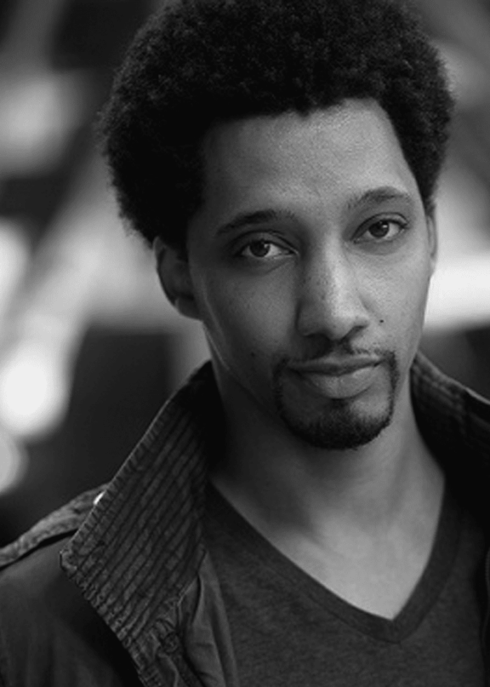Eddie K. Robinson portrait, black and white headshot with a serious expression.
