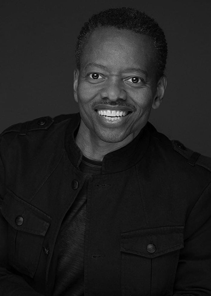 Smiling man in a black jacket, portrait