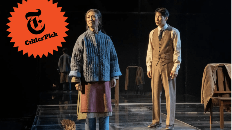 Actors in "The Far Country" stage production: A woman in a quilted jacket and a man in a vest. New York Times Critics' Pick.