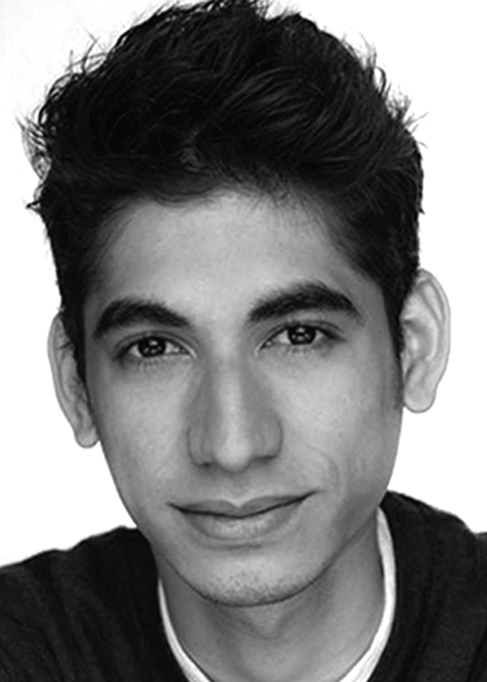 Headshot of Alexander Flores, looking directly at the camera.