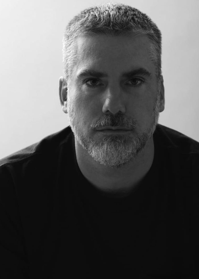 Glenn Fitzgerald portrait, man with graying hair and beard, looking directly at the camera.