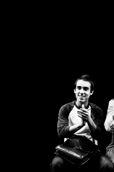 Black and white photo of a man and woman reacting to a performance; "Jackie and Me