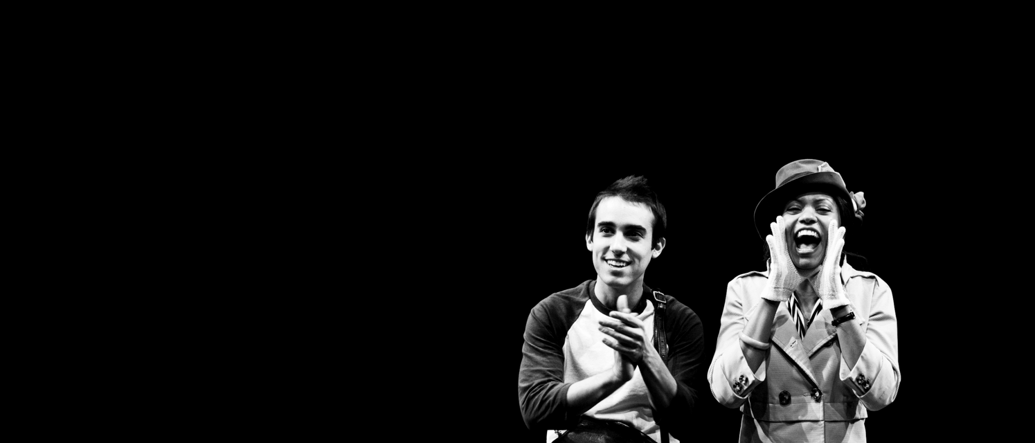 Black and white photo of a man and woman reacting to a performance; "Jackie and Me
