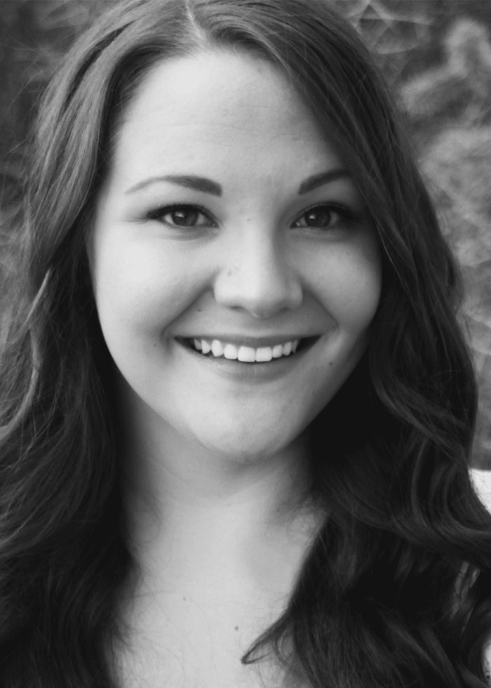 Smiling woman with long wavy hair, Jamee Hanson