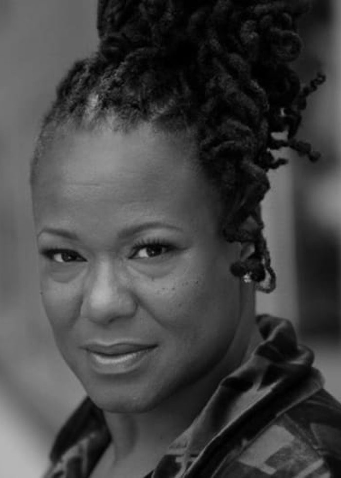 Kecia Lewis, actress, smiling, with locs