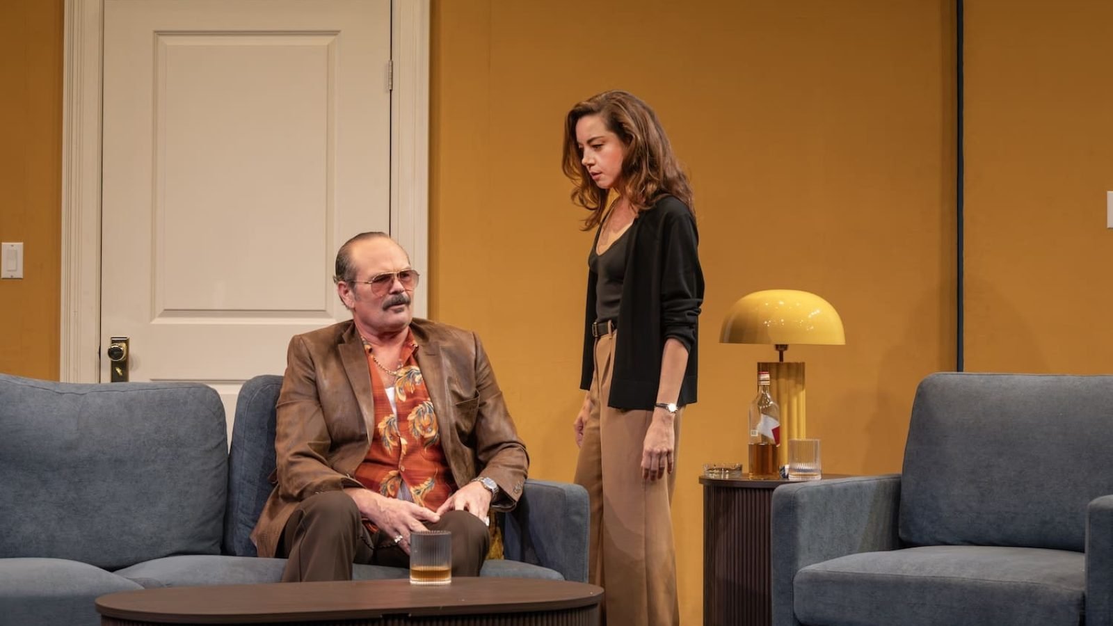 Aubrey Plaza and Liev Schreiber in a scene from "Let's Love!" on stage.