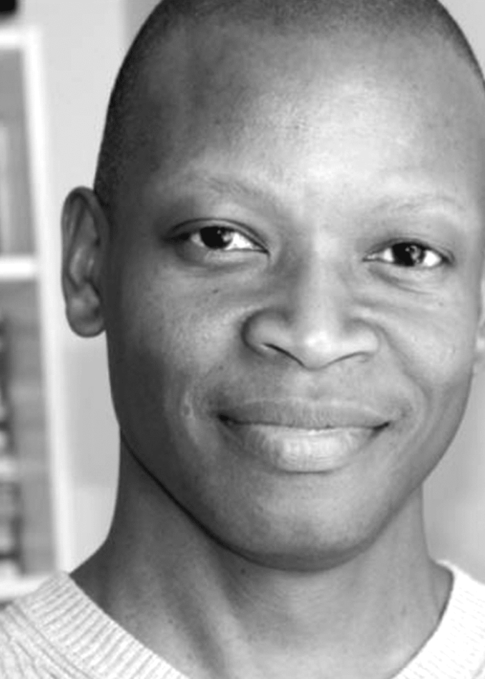 Lawrence Gilliard Jr. smiling, close-up headshot