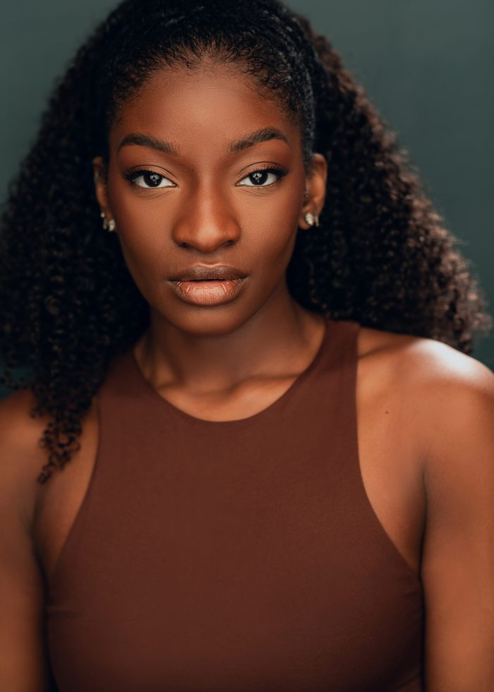 Leandra Ellis-Gaston Headshot (Lady in blue)