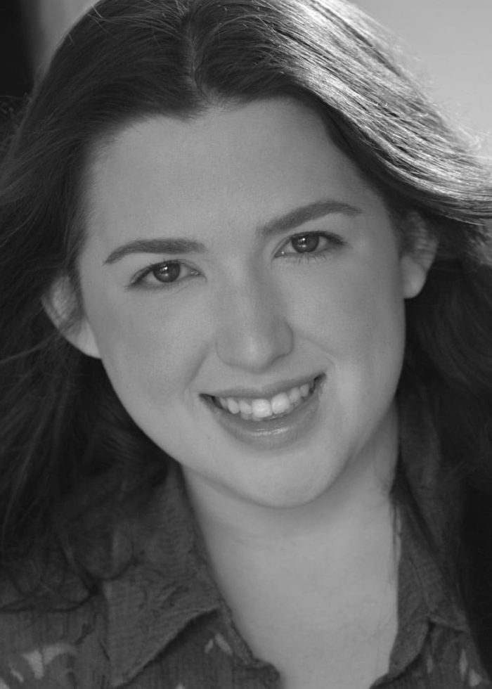 Leanne Brunn smiles in a black and white headshot.