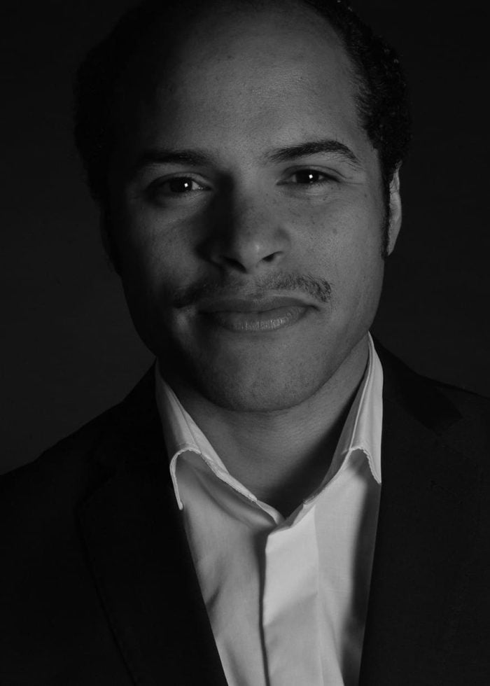 Portrait of a man in a suit, smiling