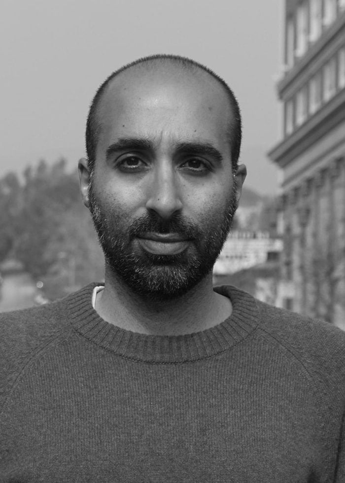 Shayan Lotfi, a man with a beard, looking directly at the camera.