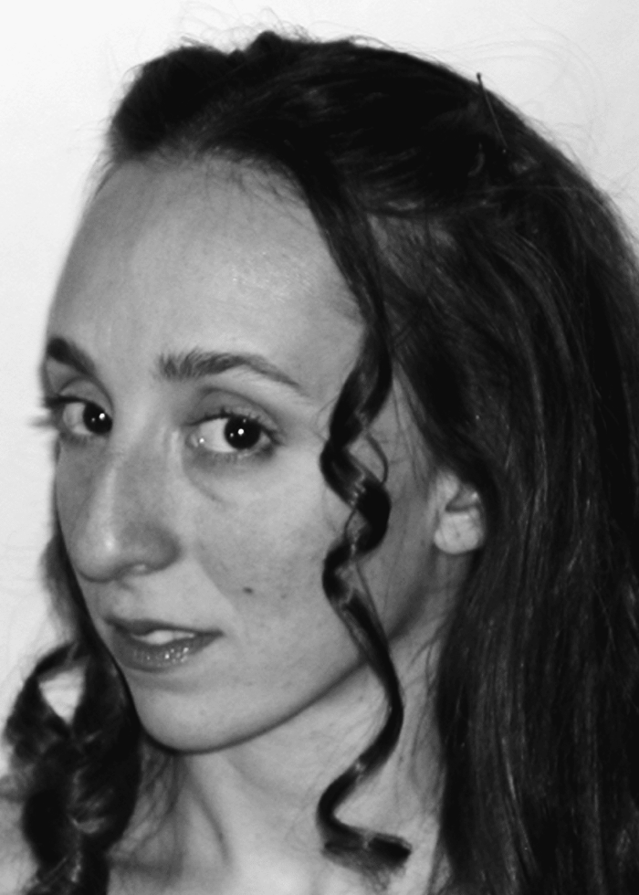 Black and white portrait of Lindsey Dietz-Marchant with curly hair