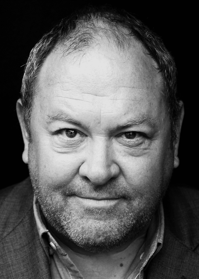 Mark-Addy Mark Addy, actor, looking directly at the camera in black and white