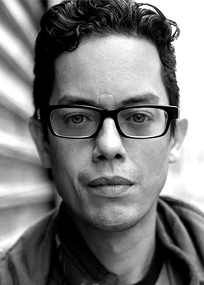Close-up portrait of a man with glasses, Flaco Navaja.
