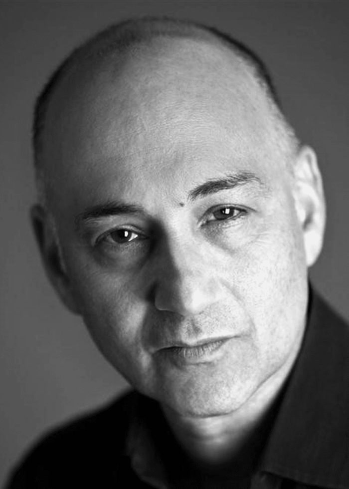 Ned Eisenberg, actor, looking directly at the camera.