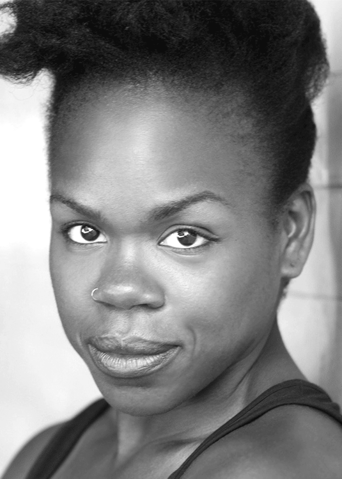 Close-up portrait of Ngozi Anyanwu, looking directly at the camera with a slight smile.