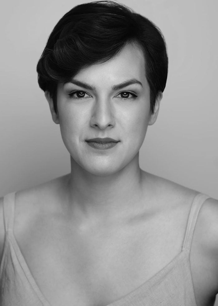 Nicole Ferguson, actress, headshot portrait with short dark hair