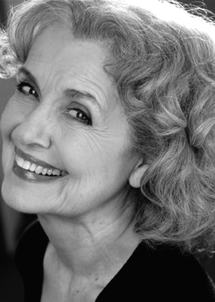 Mary Beth Peil smiling, looking at the camera