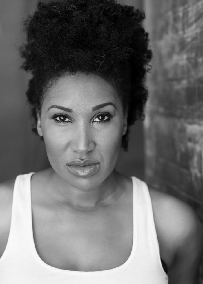 Headshot of Safiya Fredericks, black and white portrait