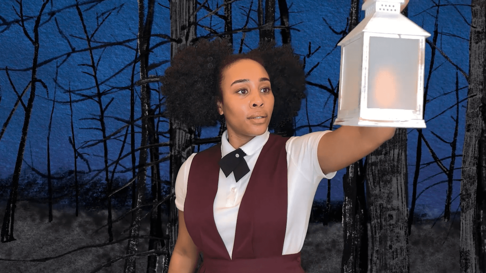 Woman in a maroon dress holds a lantern in a dark forest. "She Persisted" musical.