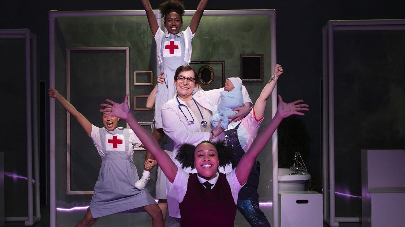 Cast of She Persisted, The Musical celebrating a birth.