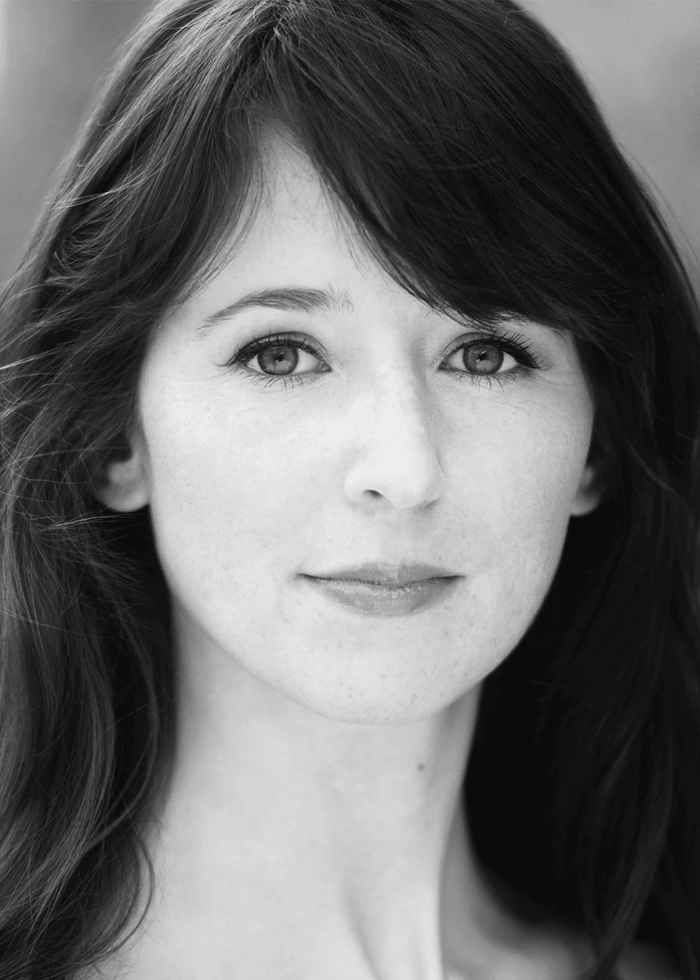 Close-up portrait of Kristen Sieh, looking directly at the camera.