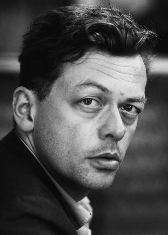 Close-up portrait of Simon Stephens, looking directly at the camera.